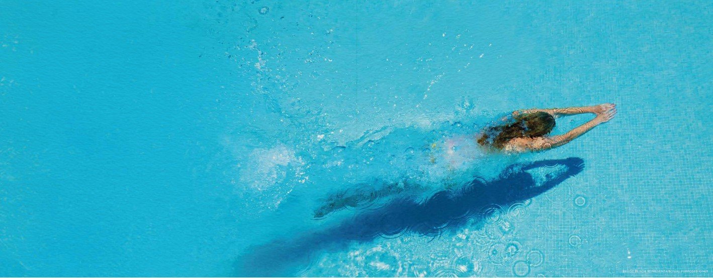 Luxury swimming pool with elegant residential backdrop in Bandra West