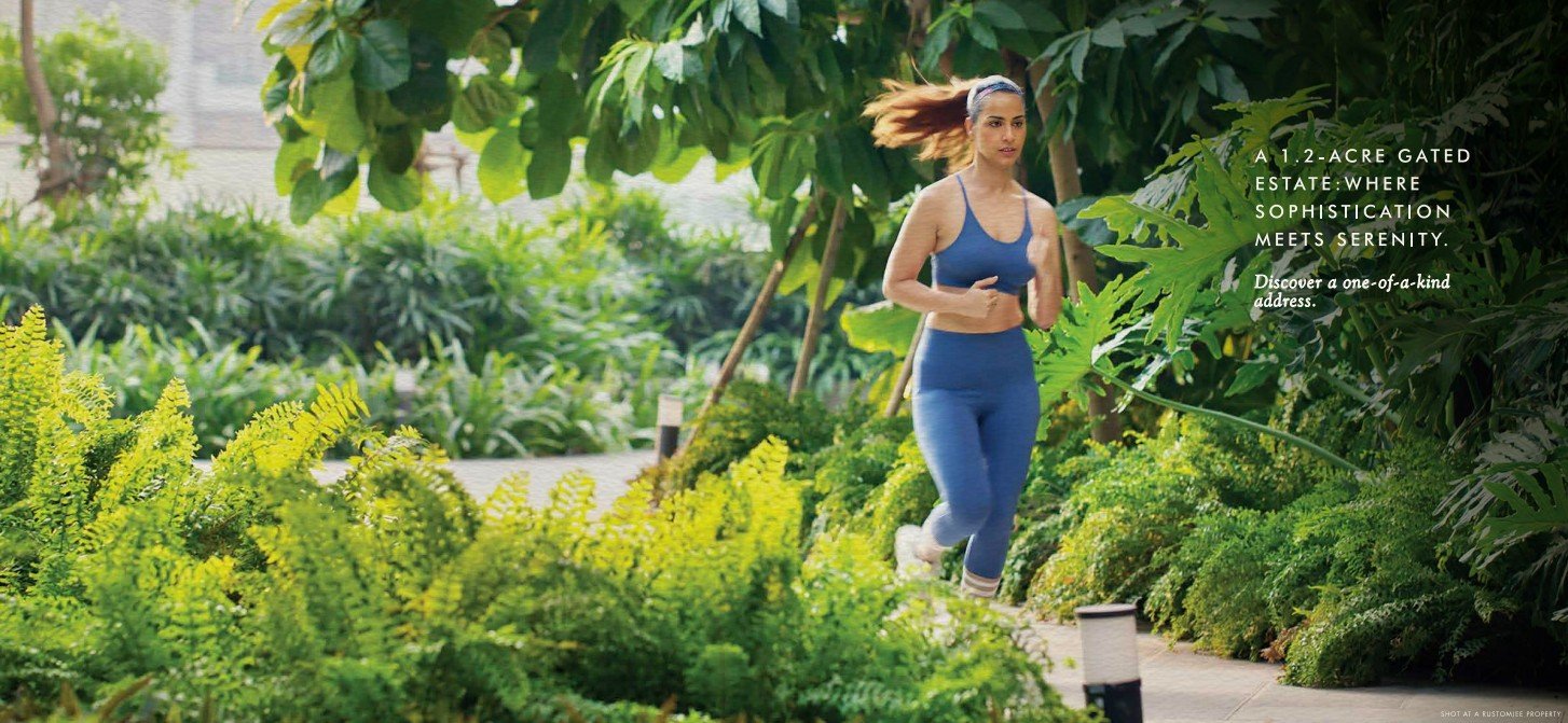 Luxury residence lifestyle with a girl jogging in the serene garden at a premium landmark in Bandra West.